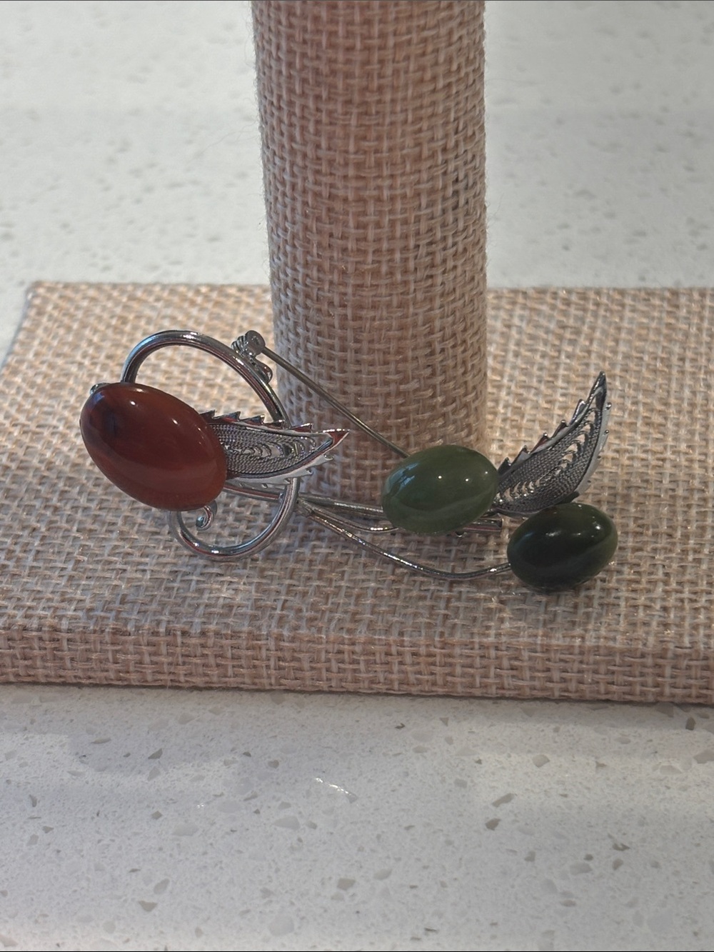 Silver Leaf Brooch with Red and Green Stones